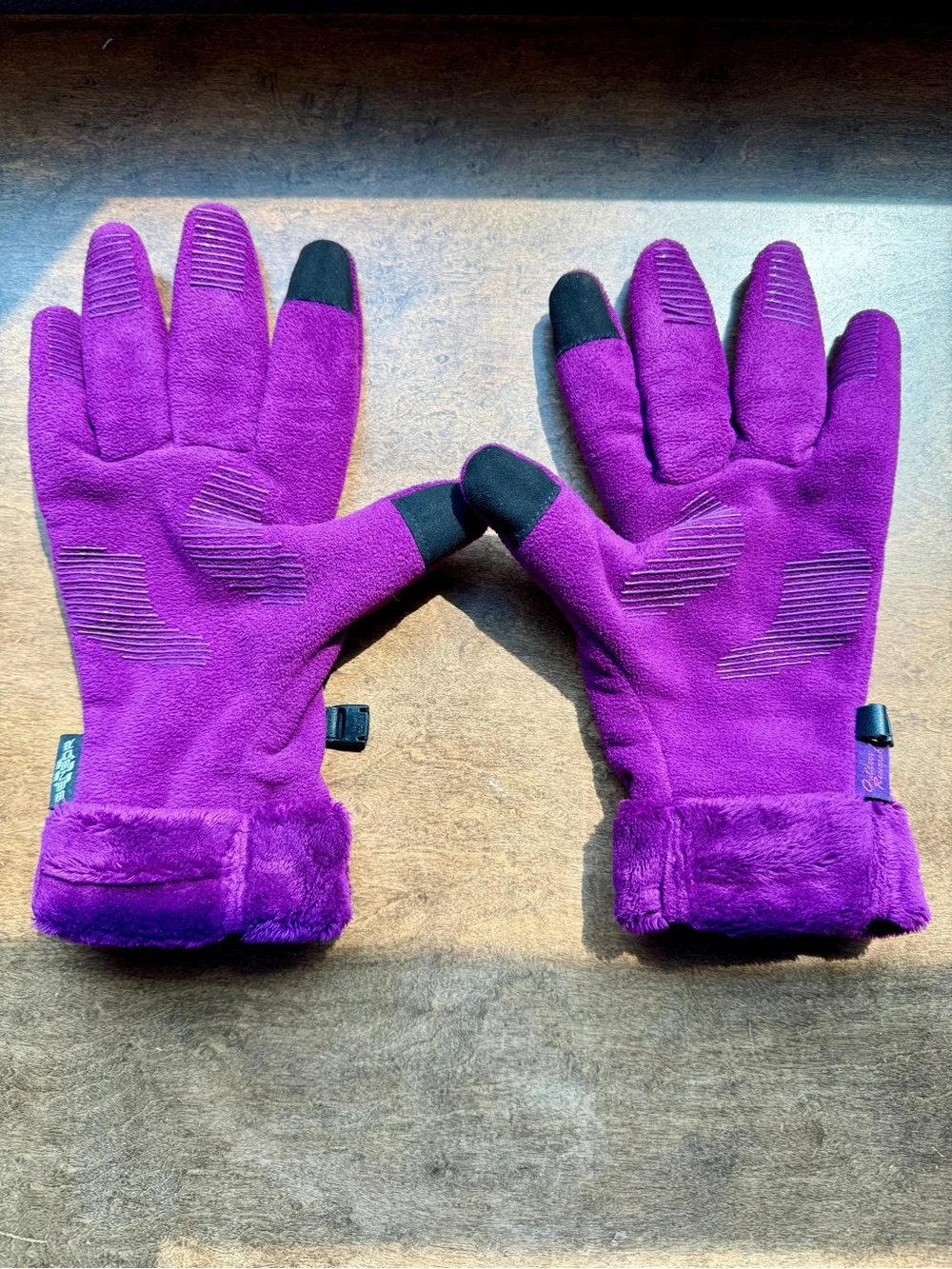 Bright Magenta Fleece Glove Pair with sensor tips.